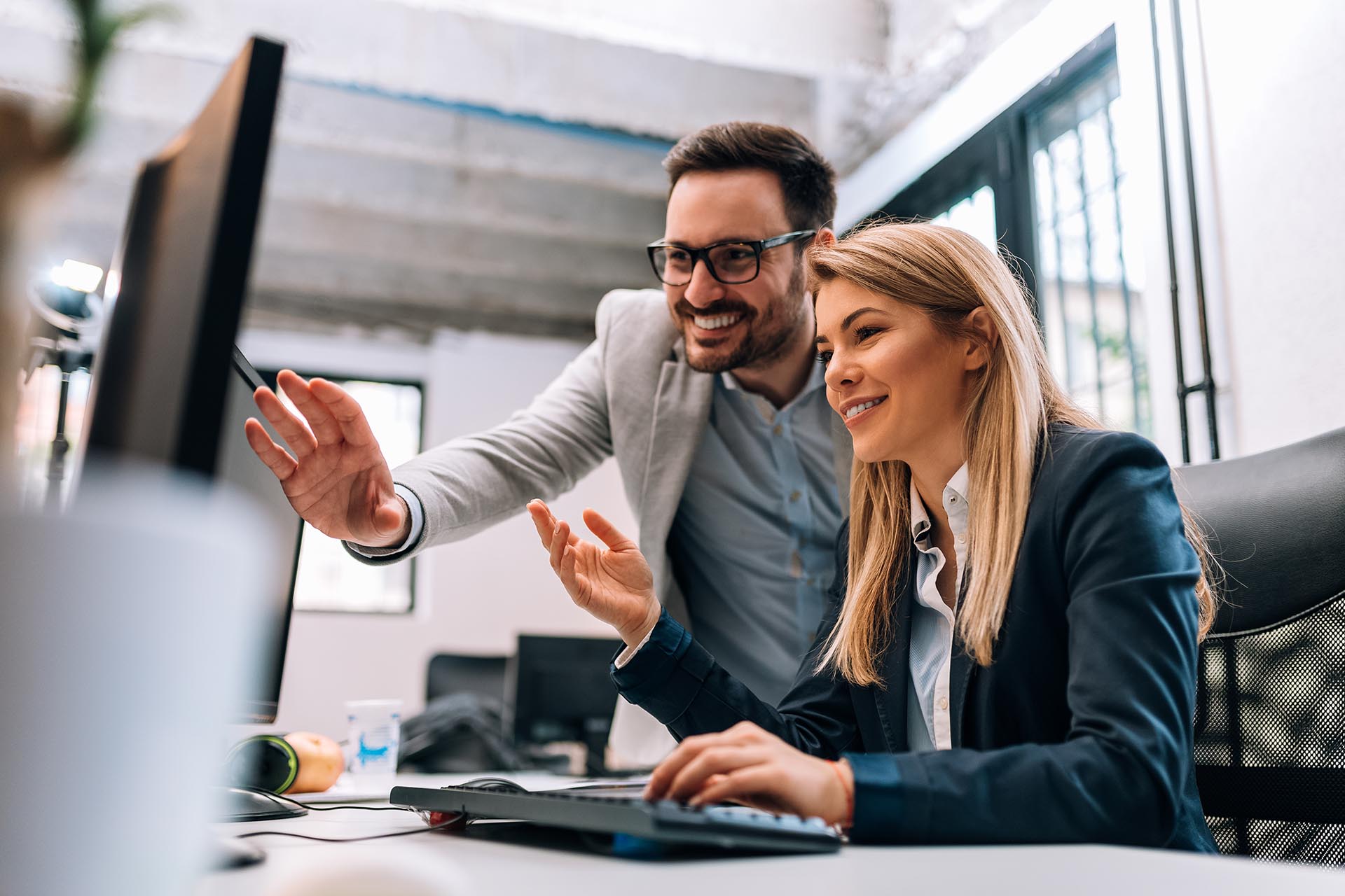 Two business colleagues working together.